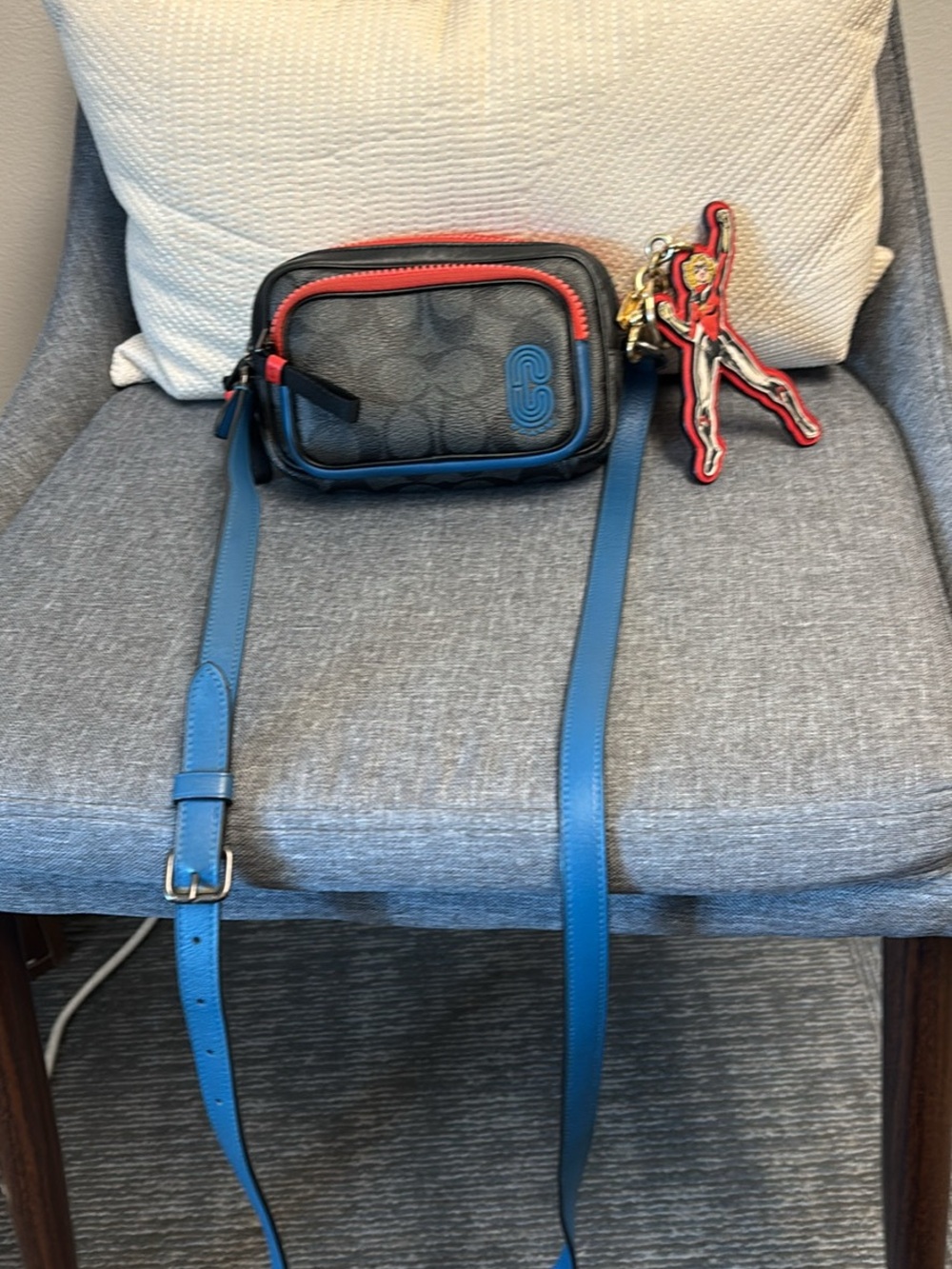 Coach Signature Canvas Crossbody with Blue Strap and Red Trim